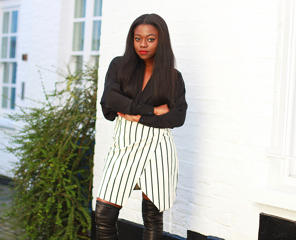 Black skirt with 2024 thigh high boots