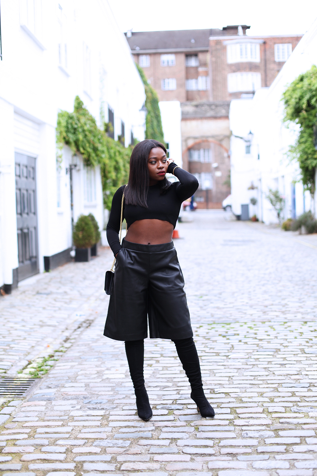 leather shorts and thigh high boots